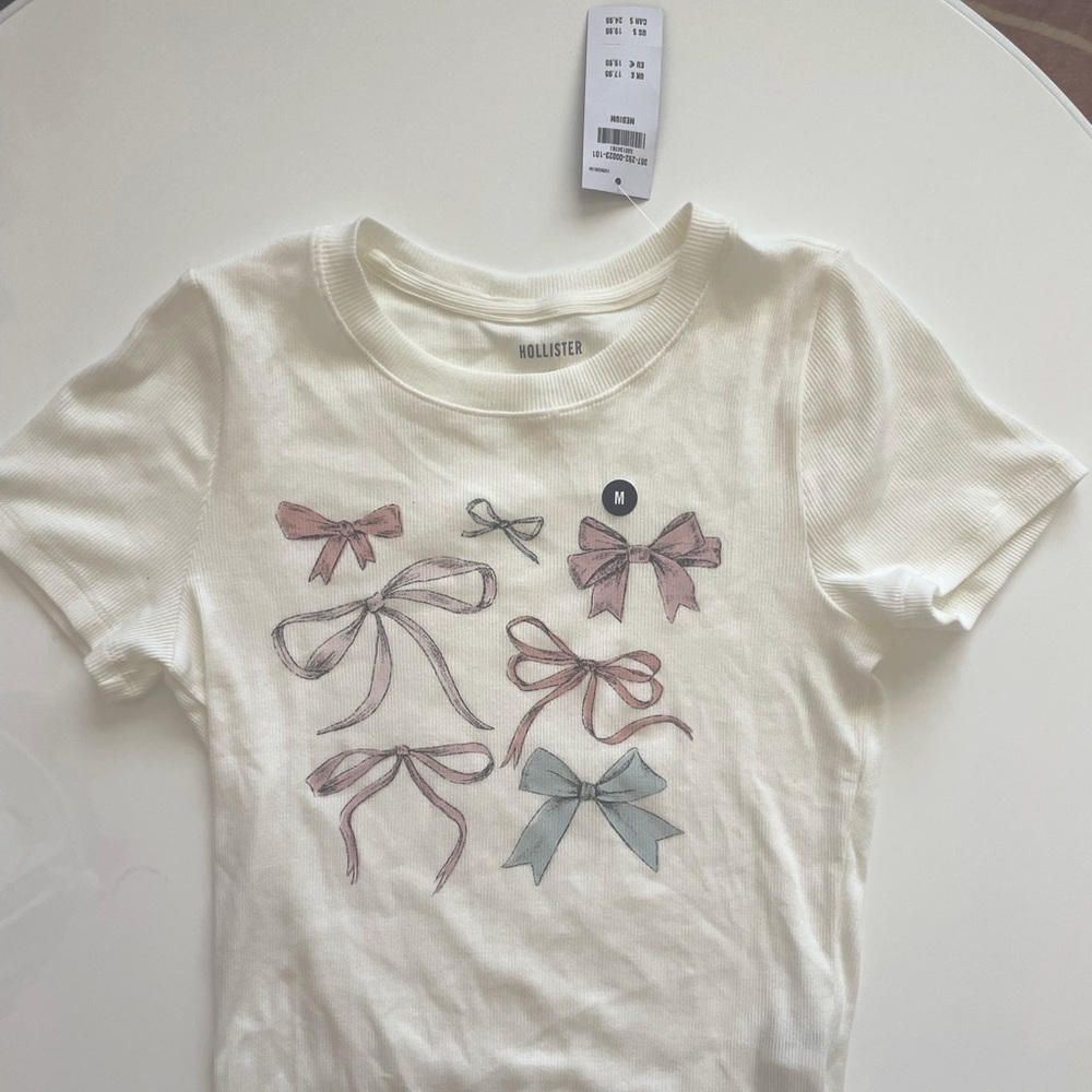 NWT Hollister Ribbed Longer Length Bow Graphic Baby Tee